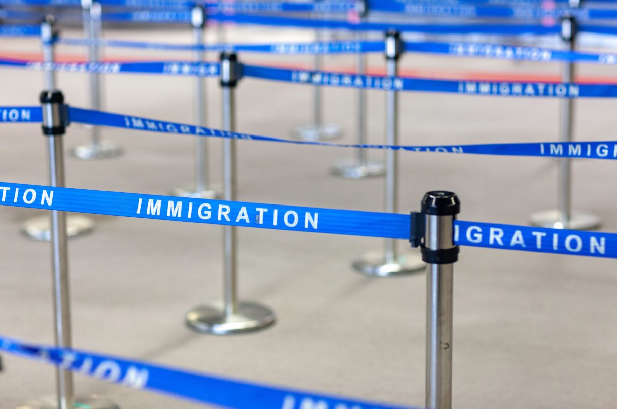 A close-up of an airport's immigration queue