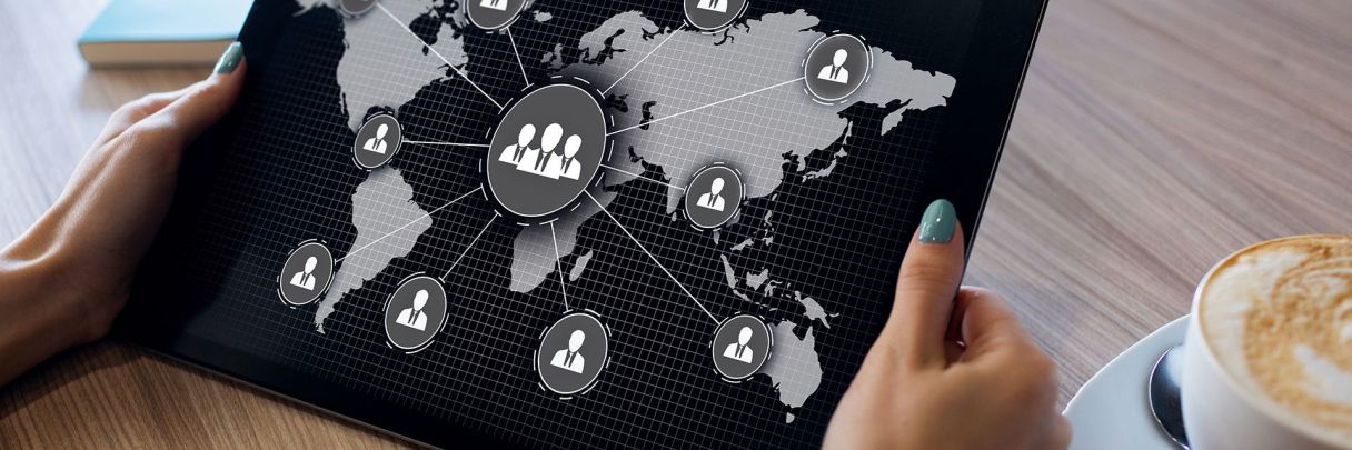 tablet showing visual of paying overseas employees