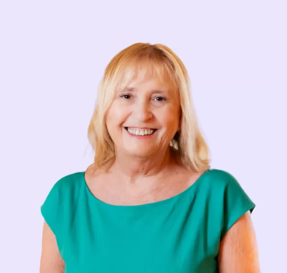 Ann Ellis Headshot with Mauve Background